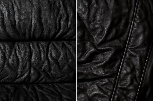 Close-up image showing harsh wrinkles in black faux leather, one on a couch and the other on a jacket, highlighting deep creases and textured folds.